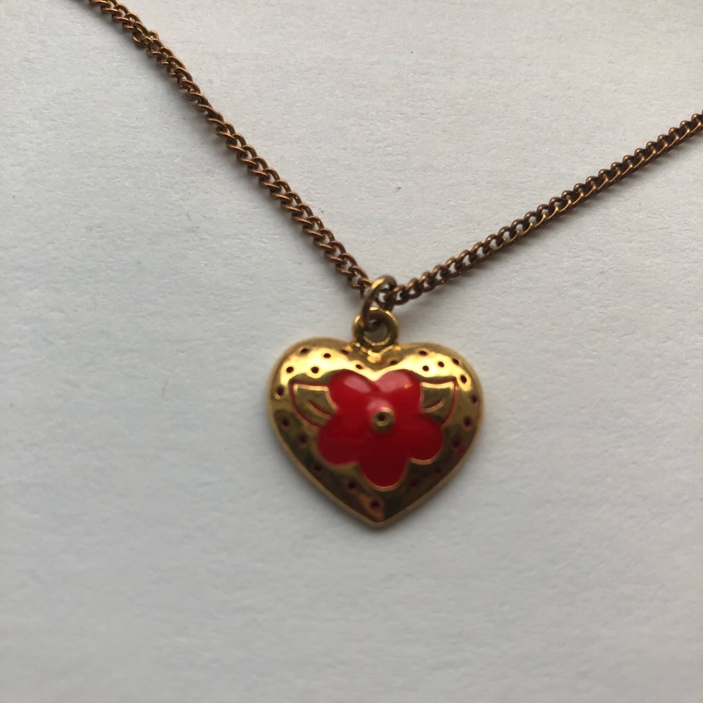 Gold heart necklace with red flower detail